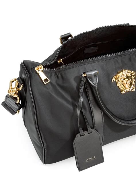 versace leather top|Versace leather duffle bag.